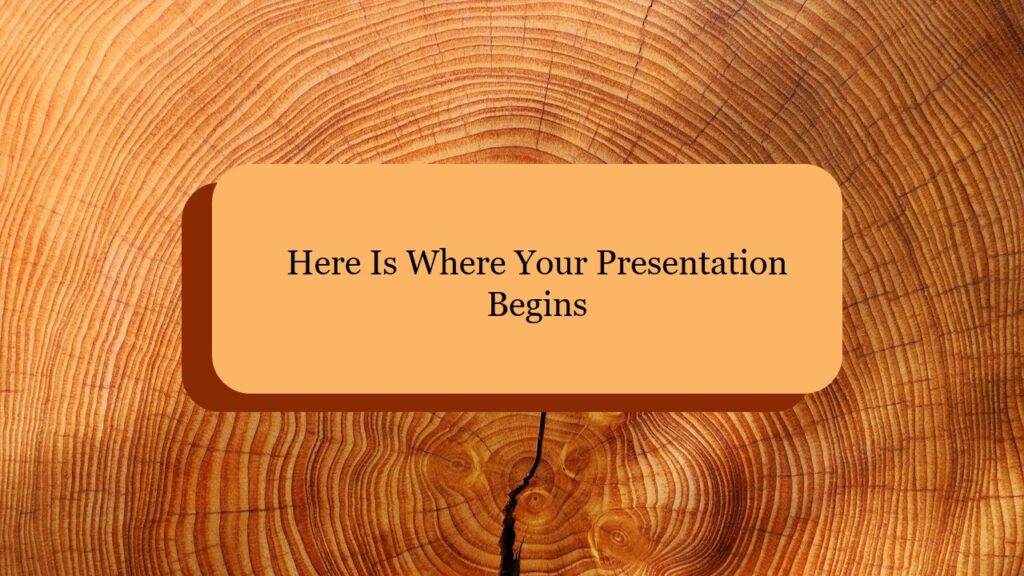 Presentation title slide: "Here is Where Your Presentation Begins" in orange text on a wooden texture background.