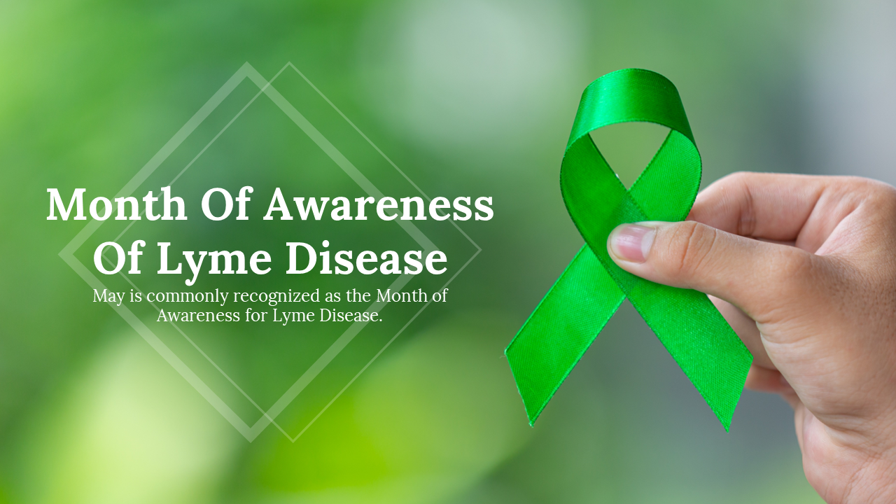 Green awareness ribbon held against a blurred natural background representing lyme disease awareness month.