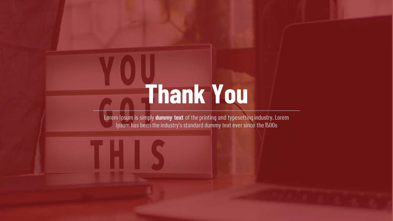 Slide featuring a thank you message over a red tinted image of a lightbox with words and a laptop.