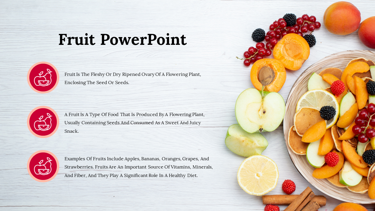 Fruit slide showing text on fruit definitions and examples, with a photo of assorted fruits on the right.