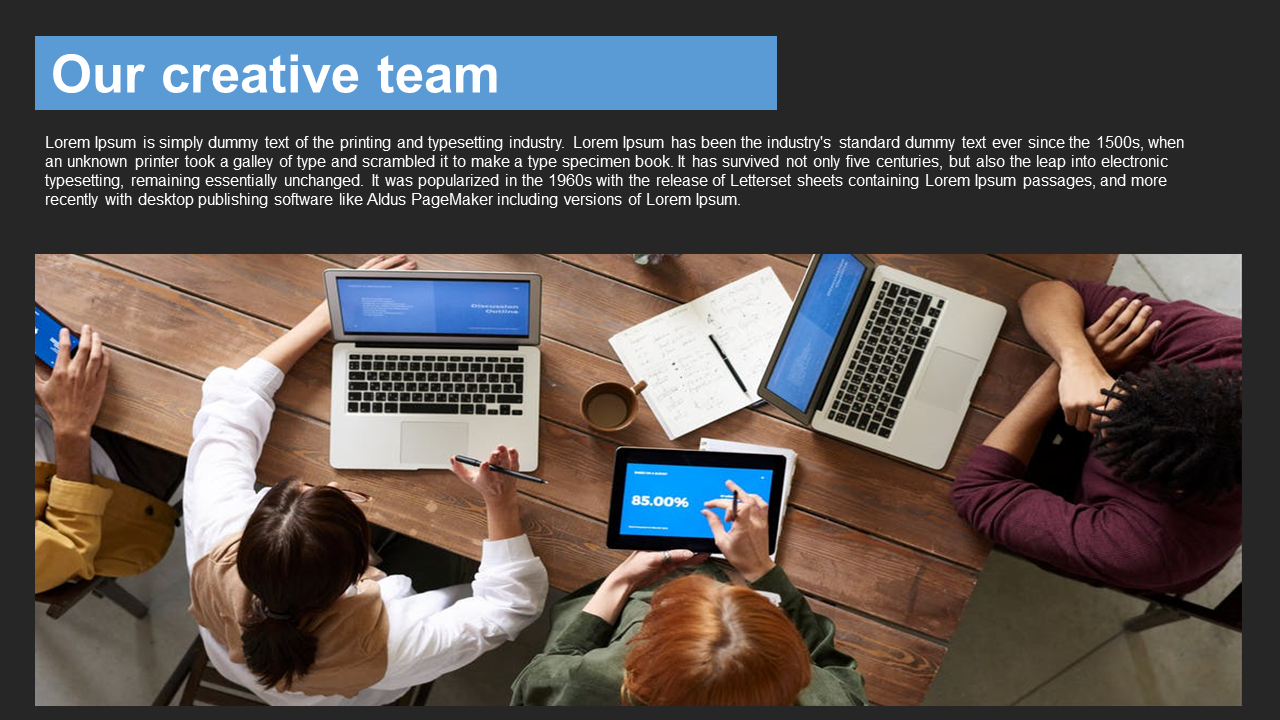 Teamwork slide with a photo of a group working together at a table with laptops and tablets.