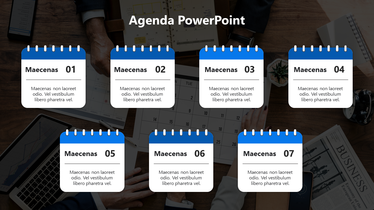 Seven white and blue notepad like cards displaying agenda items, arranged in a grid on a dark office setting.