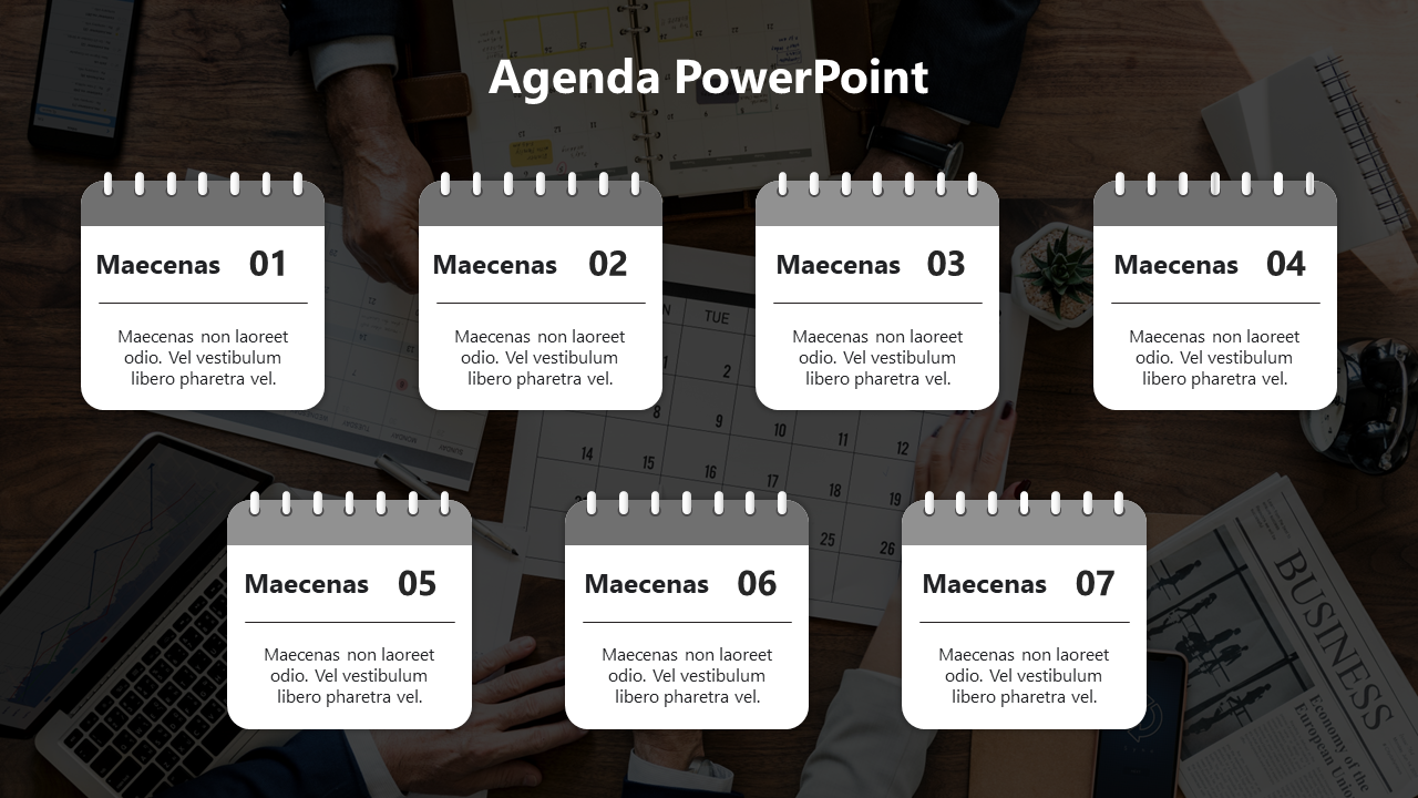 Agenda slide with seven white calendar style boxes arranged over a dark background featuring office items.