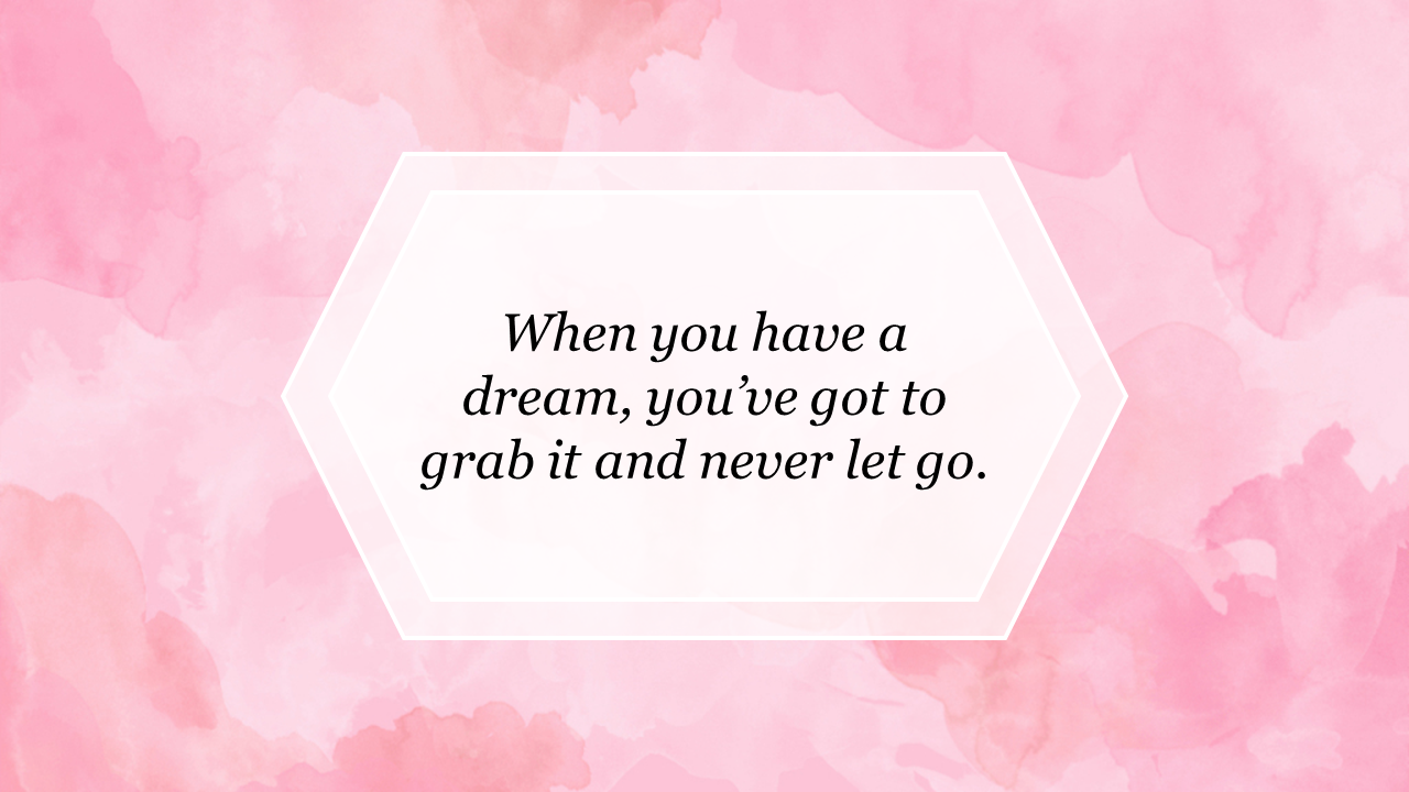 Inspirational slide with a quote about acheiving dreams in a white hexagon over a soft pink watercolor backdrop.