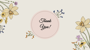 Floral themed thank you slide with delicate flowers surrounding a pink circle containing the text in script font.