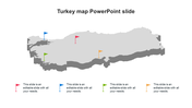 Gray 3D map of Turkey with colored flags in red, blue, green, and orange, placed across different regions.