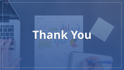 Thank you slide featuring a blurred background with a person working on a laptop and a notepad, with charts and graphs.