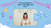 Blue baby shower slide with mother holding her belly, surrounded by cute icons like stars, safety pins, and baby clothes.