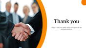 Thank you slide with a handshake between two business professionals on a white and orange background with a title text.