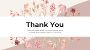 Floral theme thank you slide with a quote on gratitude, suitable for presentations, with delicate flowers in pastel colors.