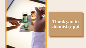 Chemistry-themed thank you slide featuring hand-holding test tubes filled with colorful liquids and title text.