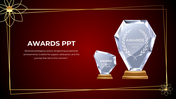 Awards PPT slide featuring two crystal trophies on a red background with a decorative golden frame and floral accents.