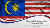 Malaysia Independence day presentation slide featuring the Malaysian flag and a brief description of the holiday.