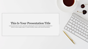 Minimalist slide design featuring a white background with a title area, a keyboard, a cup of coffee, and a gold pen.