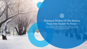 Snowy tree scene with overlapping blue circles and snowflake icon with winter greeting text overlay.